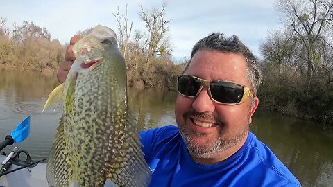 Crappie and Bass Raft Fishing The River In Winter