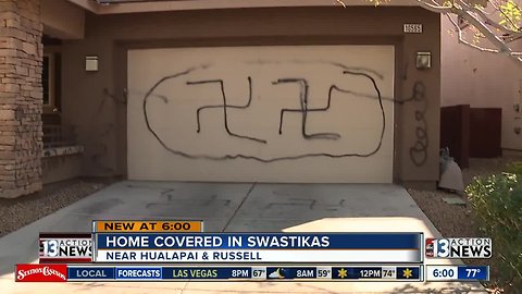 Home covered in swastikas