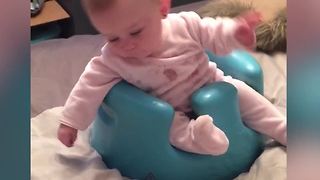 "Baby Girl Falls Out of Her Booster Chair When She Leans To Get TV Remote"