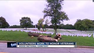 Volunteers clear branches to honor veterans