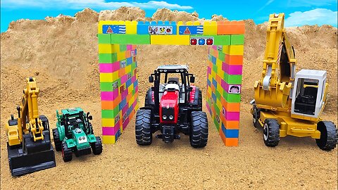 Construction vehicles pass through the magic gate