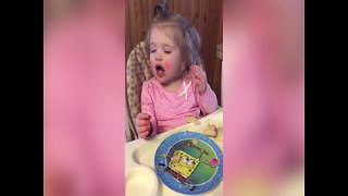 Little Girl won't let Sleep Keep her from Eating