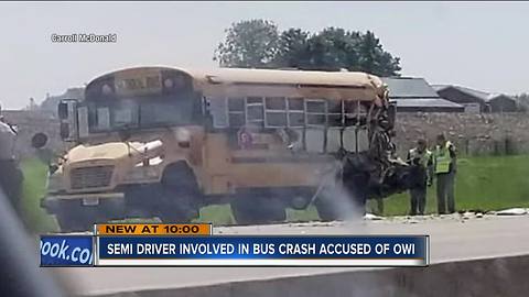 Truck driver arrested for OWI after crash with school bus