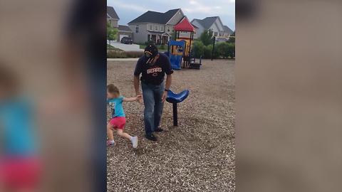 An Adorable Little Girl Gets Dizzy On A Spinning Chair