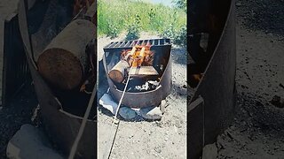 cooking hot dogs over the fire #camping #campfirecooking #exploring #travel #gonecamping