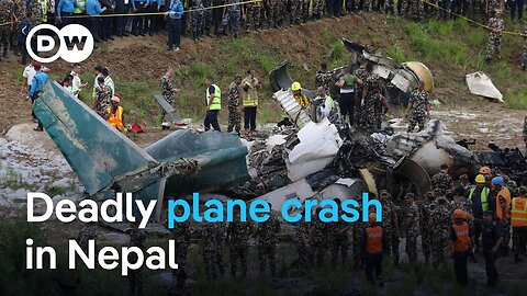 A plane crashes at Kathmandu's Tribhuvan International Airport killing 18 people | DW News