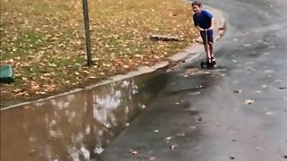 Boy Runs Into Muddy Water and Falls On His Face