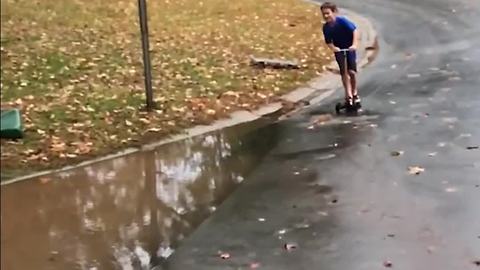 Boy Runs Into Muddy Water and Falls On His Face