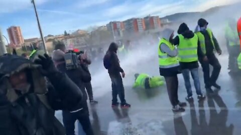 Trieste, Italy - Police using water cannon on peaceful protesters