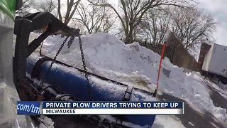 Snow plow drivers struggle to keep up with snowfall
