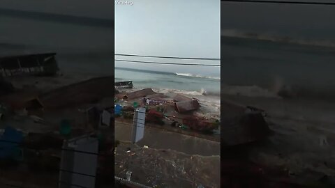 Tsunami Crashes into Indonesian City