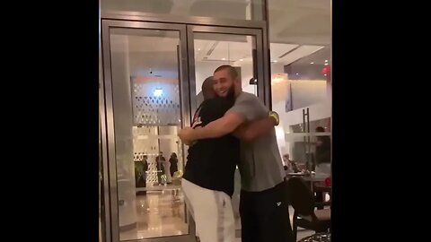 Khamzat Chimaev wrestling with Daniel Cormier in Abu Dhabi