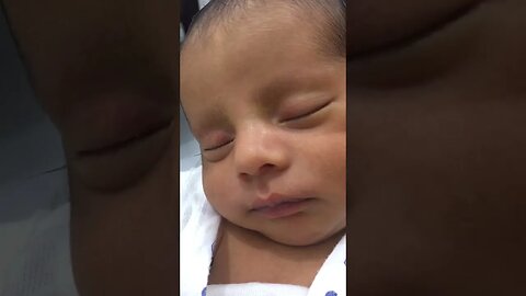 Newborn dreaming baby