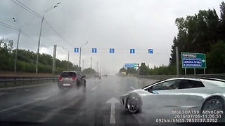 Cringeworthy Footage Of A Lamborghini Hydroplaning Into A Car