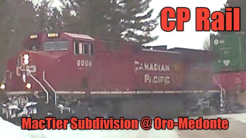 CP Rail MacTier Subdivision @ Oro-Medonte for 8004 S with dpus 9818 and 8957.
