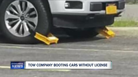 Tow company booting cars without license