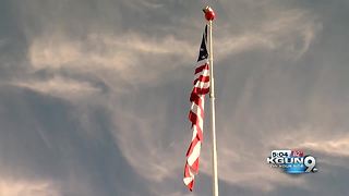 Dealership starts new flag-raising tradition