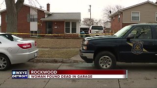 Police investigate death of woman found in garage
