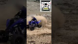 YAMAHA QUAD BIKE TEARING UP A BEACH