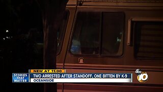 Two arrested after standoff, one bitten by K-9