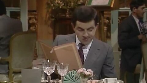 MrBean arrives at aa restaurant on his birthday,