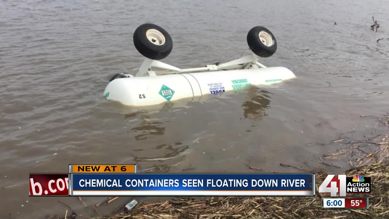 Historic flooding sends chemical containers floating downriver