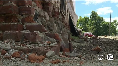Reconstruction of historic Holly Hotel halted amid lawsuit over property line