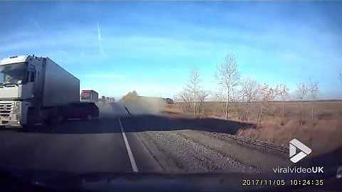 Lucky driver escapes collision on highway