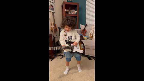 4 years old guitarist