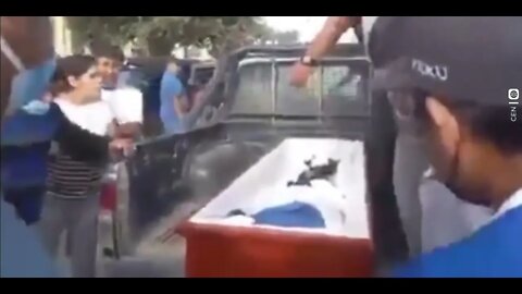 Woman bangs on her coffin lid as she's about to be buried at her own FUNERAL.