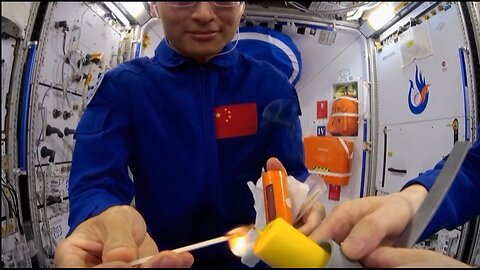 Watch Chinese astronauts light a match on Tiangong space station (video)