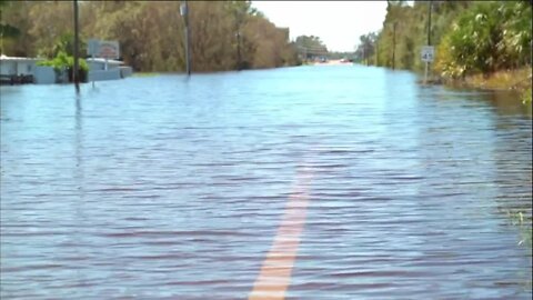 Adam Walser reporting on the aftermath of Hurricane Ian in Hardee County and the surrounding areas