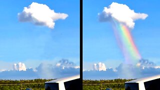 Rainbow Pours Out of Cloud