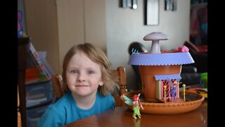 Daughter Plays With Fairy Garden