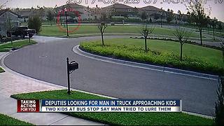 Deputies search for man in truck who tried to lure kids at bus stop
