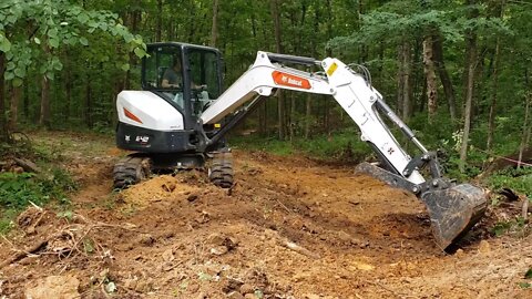 Improving a client property! #1 fixing & rerouting water erosion ditch Bobcat e42 R2 series Mini