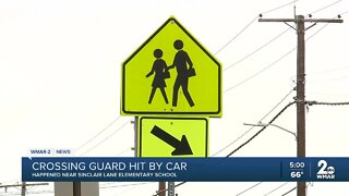 Elementary school crossing guard critically injured after being hit by car in Northeast Baltimore