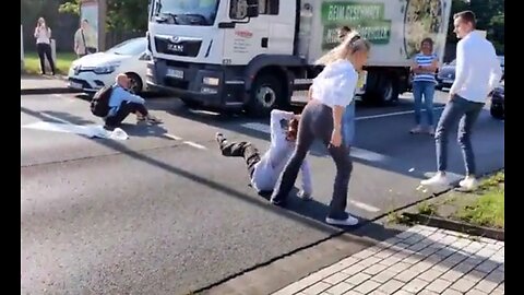 Woman Drags Climate Crazy By Hair For Blocking Traffic