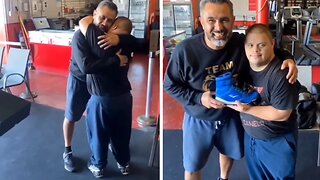 Boxing coach surprises down syndrome student with new shoes