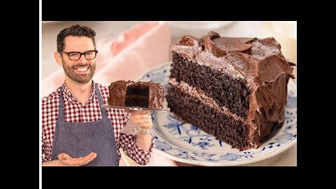 Chocolate cake with a whole block of chocolate on top