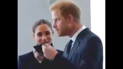 Prince Harry and Meghan Markle pretend to wear masks for photo shooting Sept. 2021