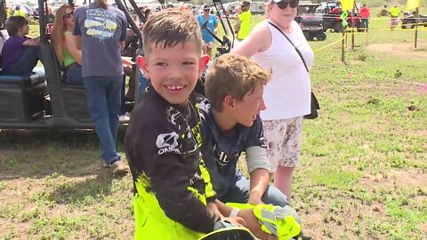 7-year-old double amputee competes in four-wheeler race