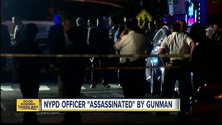 NYPD officer 'assassinated' by gunman