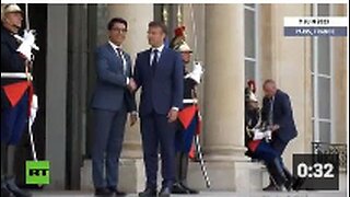 French Guard Collapses Right in Front of French Puppet President Macron