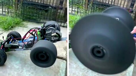 Tire expands from centripetal force, but how much! Awesome