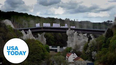 Bridge demolition using 330 pounds of explosives leaves crowd in awe | USA TODAY