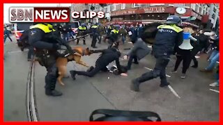 PEOPLE MAULED BY POLICE DOGS, BEATEN WITH BATONS AT PROTEST" AGAINST COVID RESTRICTIONS - 5781