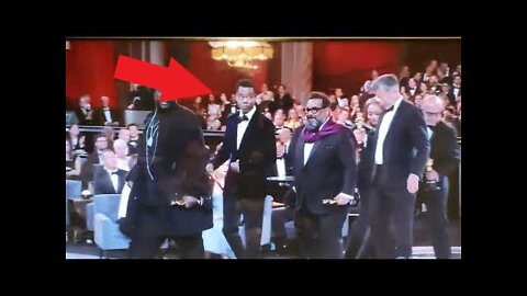 Chris Rocks reaction to getting punched in the face by Will Smith at the Oscars