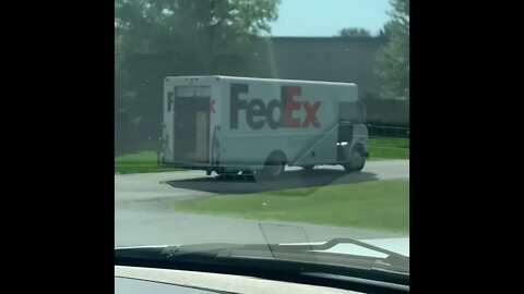 FedEx Driver Peels Off With Back Door Open