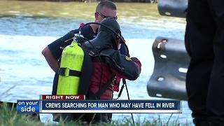 Divers search the Cuyahoga River for missing man